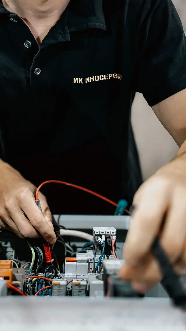 Electrician performing a commercial electrical inspection