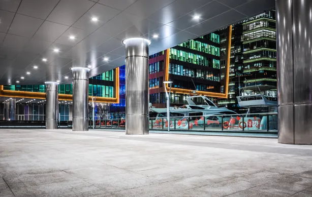 Commercial building interior with modern LED lighting installed across open-plan workspace areas