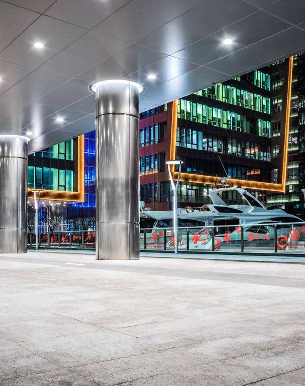 Commercial building interior with modern LED lighting installed across open-plan workspace areas